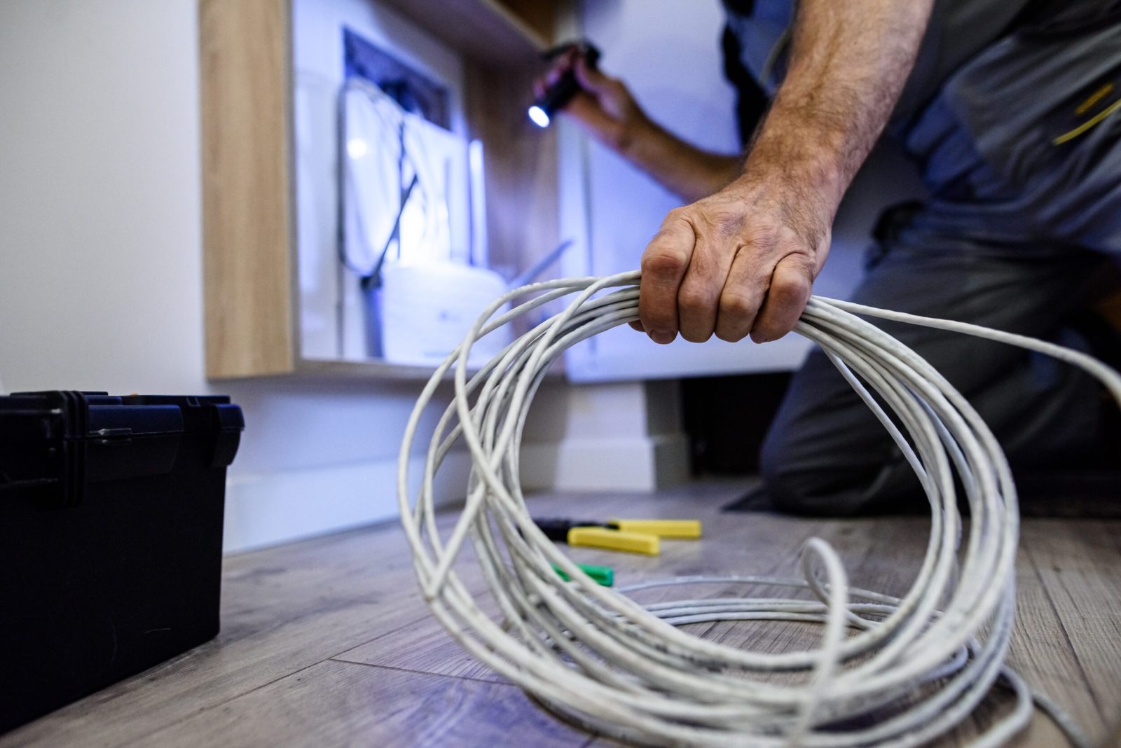 Close up shot of repairman in uniform working.