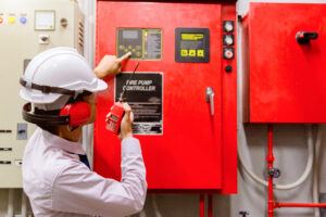 Engineer checking Industrial fire control system