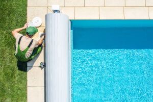 Outdoor Swimming Pool Skimmer Filter Cleaning Aerial View