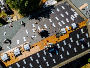 Removal of old roof and replacement roofs with new roof shingle