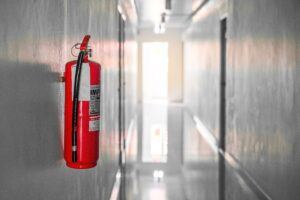 Fire extinguisher system on the wall background, powerful emerge