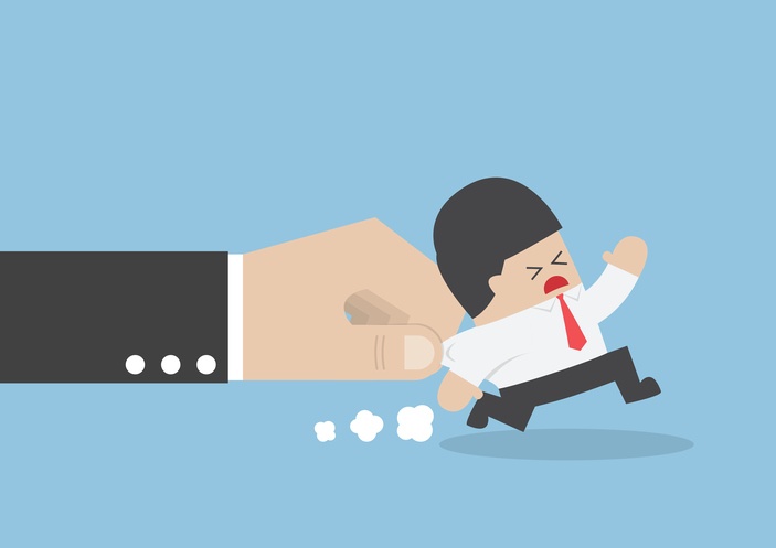 business man who is trying to run away from technician scheduling challenges