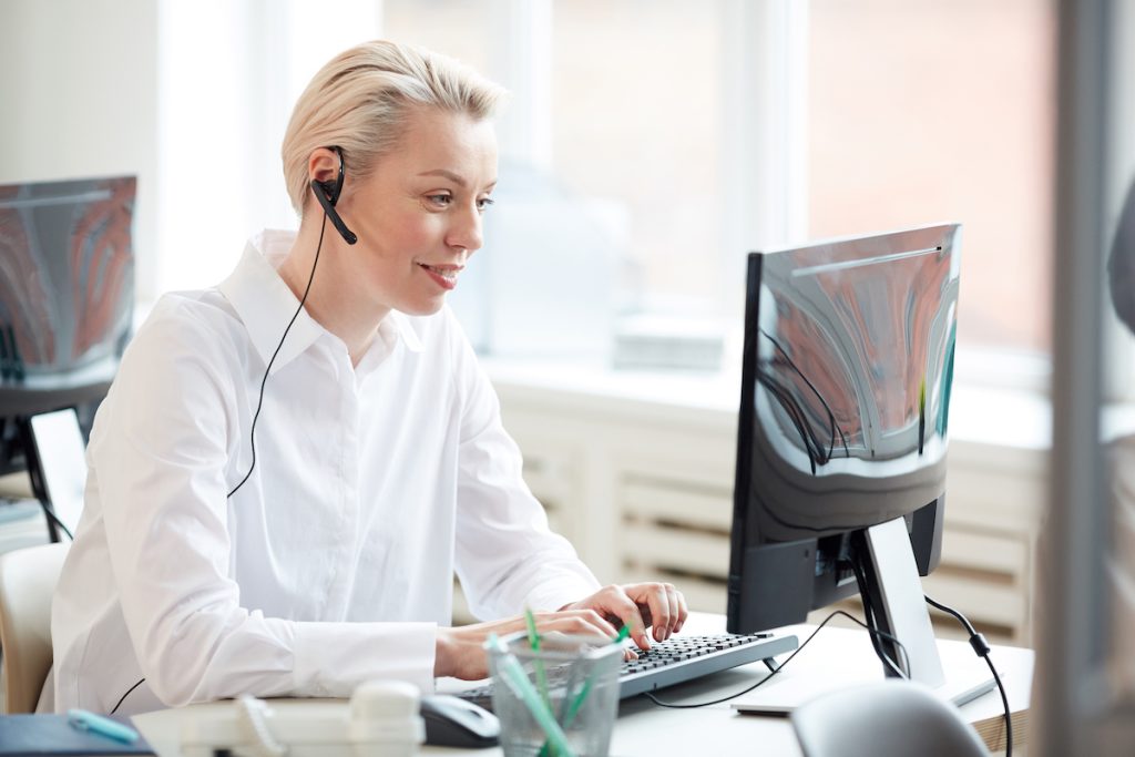 call center woman working on reliability maintenance management 