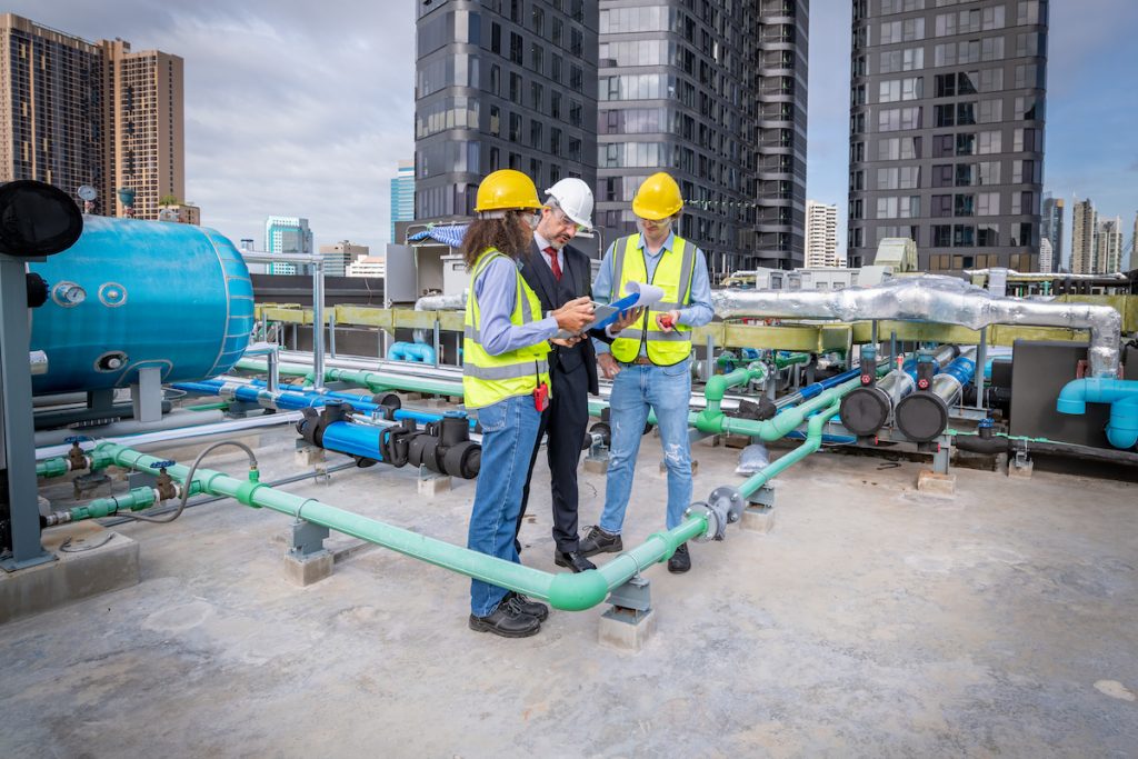 employees making the industry standard hvac business profit margin on a roof