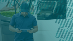 route optimisation, technician using tablet next to white van